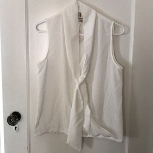 White sleeveless blouse with tie